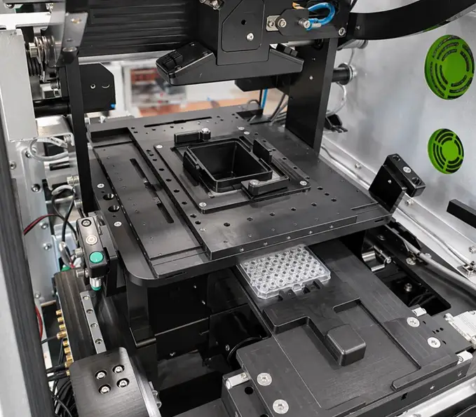 Image of a deck on an instrument designed for automated microplate handling, developed with our team’s deep multidisciplinary engineering expertise in life science instrumentation.